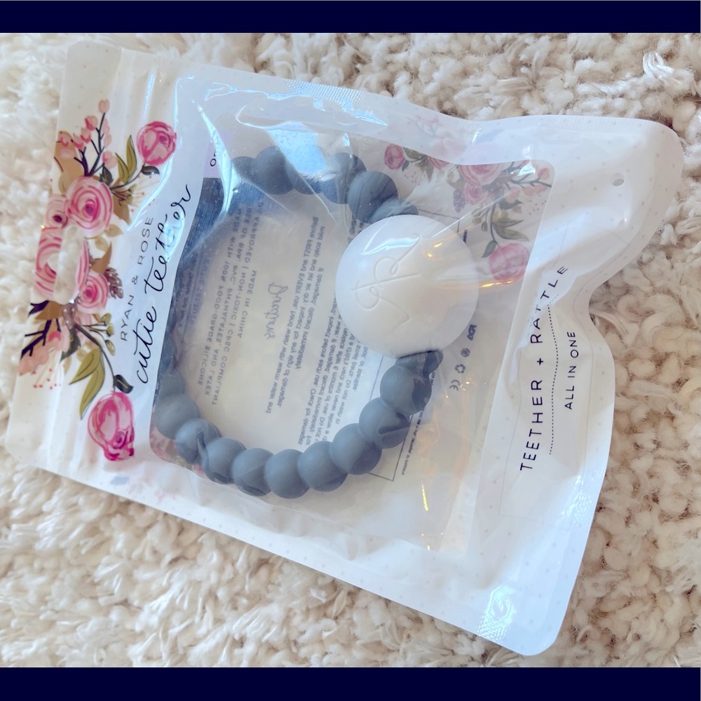 Tether and rattle